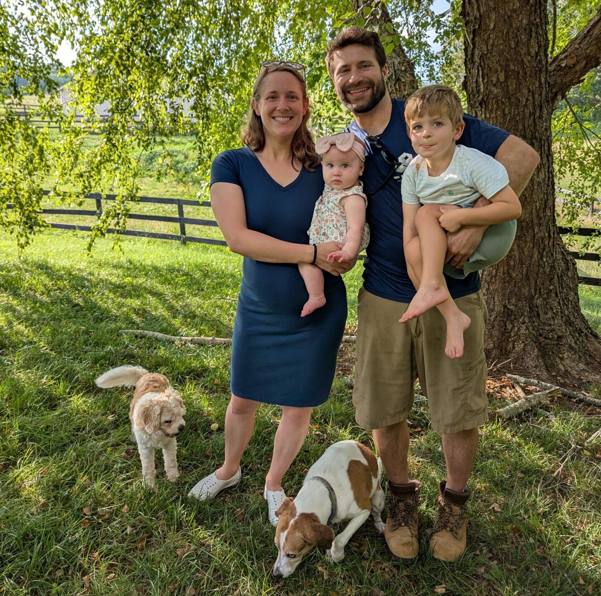 Seth Brown with his family and dogs outdoors